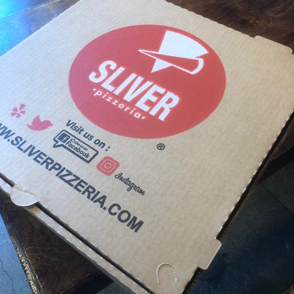 Photo taken at Sliver Pizzeria by Pamela R. on 4/29/2022
