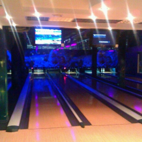 Photo taken at КосмоДоМ bowling &amp; bar by Андрей Д. on 11/18/2012