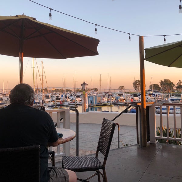 Photo taken at Buster&#39;s Beachhouse Grill &amp; Longboard Bar by RICH K. on 10/16/2018