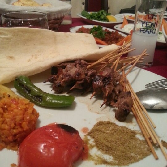 Photo taken at Topçu Restaurant by Gizem on 3/8/2013