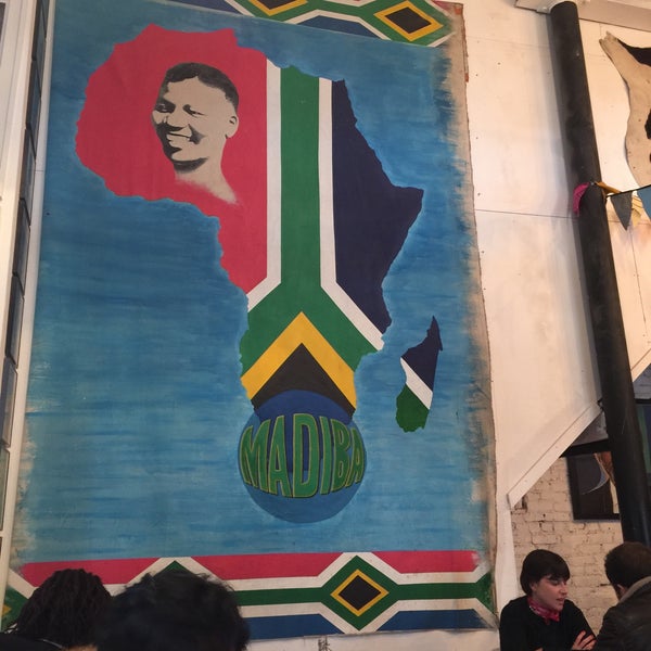 Photo taken at Madiba Restaurant by Rob C. on 3/18/2017