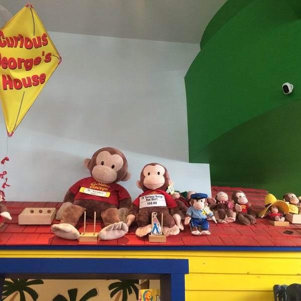Photo taken at World&#39;s Only Curious George Store by Tiffany T. on 8/24/2016