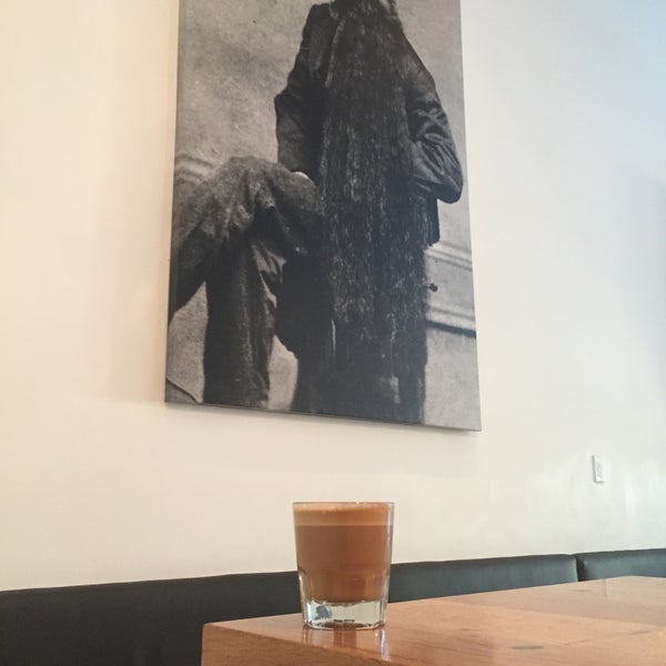 Photo taken at Primo Passo Coffee Co. by Fred W. on 3/24/2015