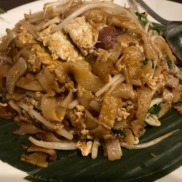 Char Koay Teow (炒粿条) (Malaysia signature flat noodles stir fried over very high heat with light and dark soy sauce, chili, shrimps, squids, bean sprouts, chopped Chinese chives and Chinese sausage)