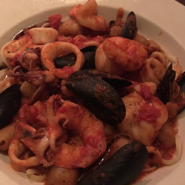 Seafood Diavola (Shrimp, mussels, scallops, and calamari, sauteéd in a spicy red sauce served over linguini)