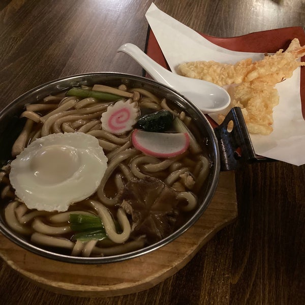 Nabeyaki Udon (thick noodles in soy broth . tempura shrimp . egg . fishcake . chicken)