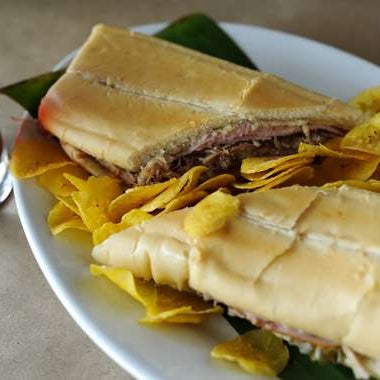 Tenreiro’s Cuban is pretty traditional, though his pork is shredded rather than sliced, a nod to his South Cuba roots. He also adds a touch of butter to his sandwich — but don’t ask him to add mayo.