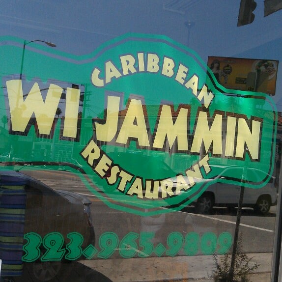 Photo taken at Wi Jammin Caribbean Restaurant by Allison V. on 8/18/2013