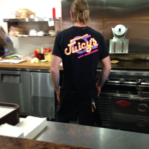 Photo taken at Juicy&#39;s Giant Hamburgers by @ngie on 10/6/2013