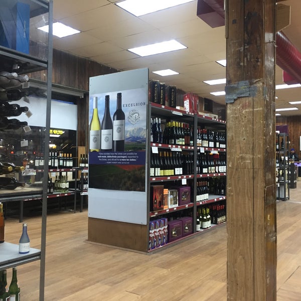 Photo taken at Grand Wine &amp; Liquors by Stephanie P. on 2/21/2016
