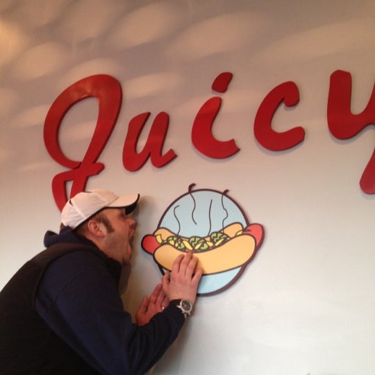 Photo taken at Juicy Burgers &amp; Dogs by Lisa G. on 11/17/2012