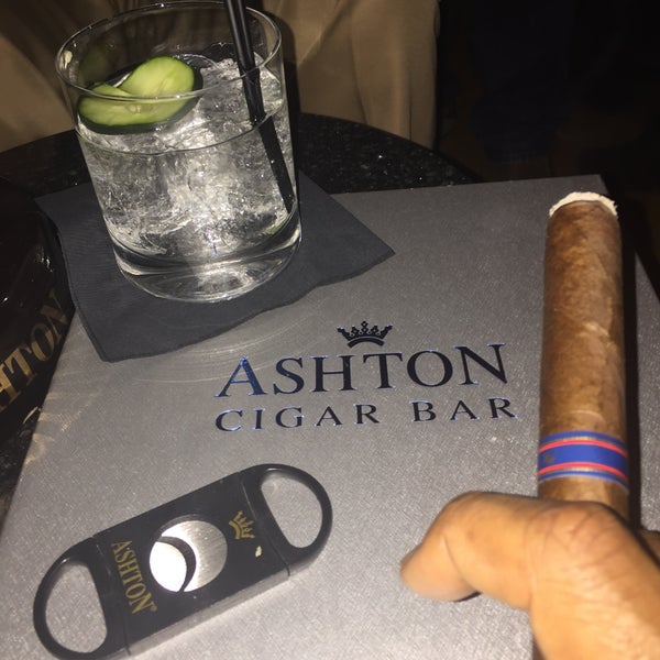 Photo taken at Ashton Cigar Bar by J-MINK on 3/29/2015