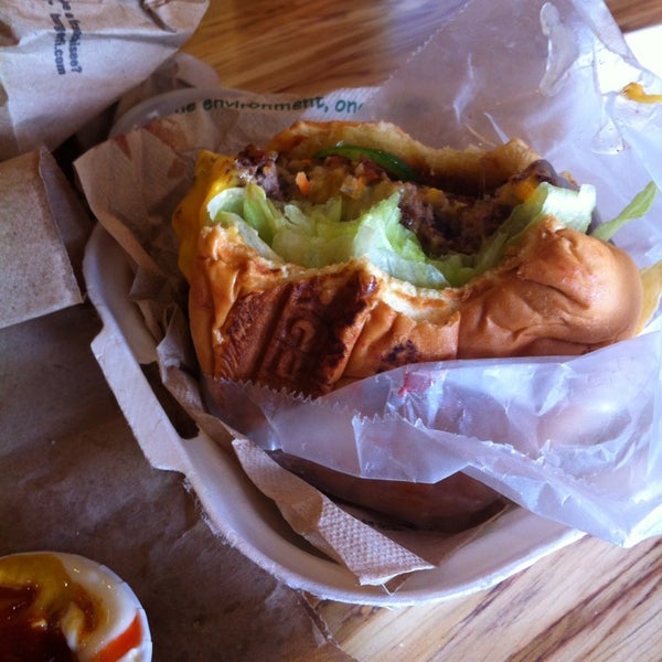 Photo taken at BurgerFi by Mel C. on 6/14/2013
