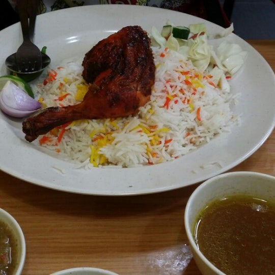 Photo taken at Al Raudah Arabian Food by Alam J. on 7/1/2014
