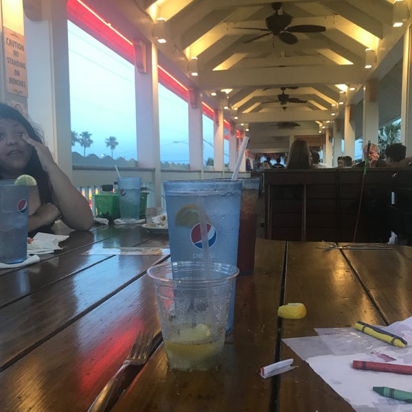 Photo taken at Sunset Grille by Angel O. on 6/19/2018