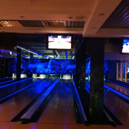 Photo taken at КосмоДоМ bowling &amp; bar by Natalia Y. on 12/2/2012
