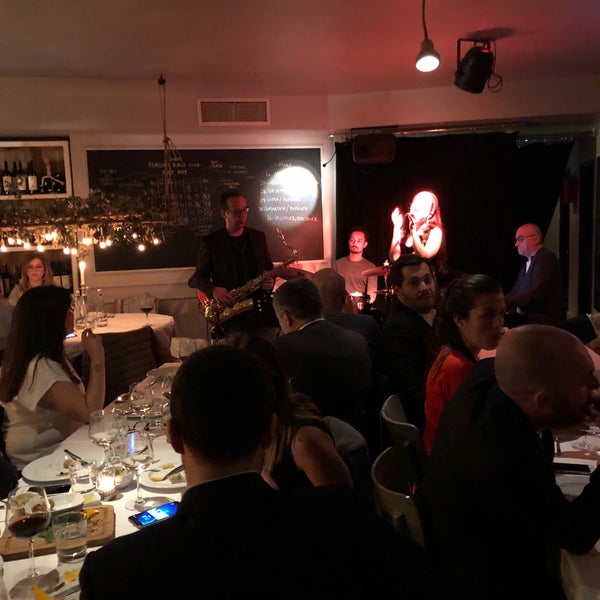 Photo taken at Divine Brasserie &amp; Jazz Club by Ali B. on 3/28/2019