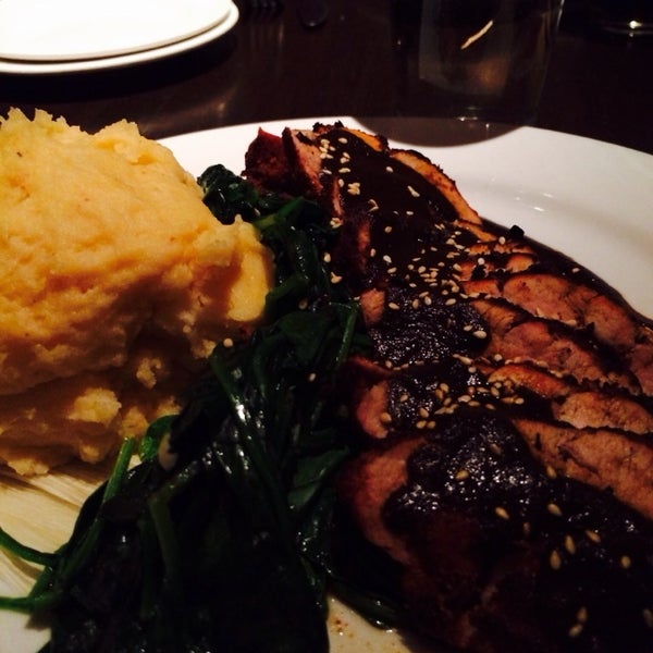 Pork tenderloin with mole, spinach and chipotle mashed potatoes is delicious.