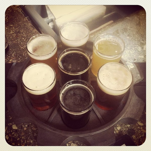 Photo taken at Kinetic Brewing Company by Amanda A. on 3/30/2013
