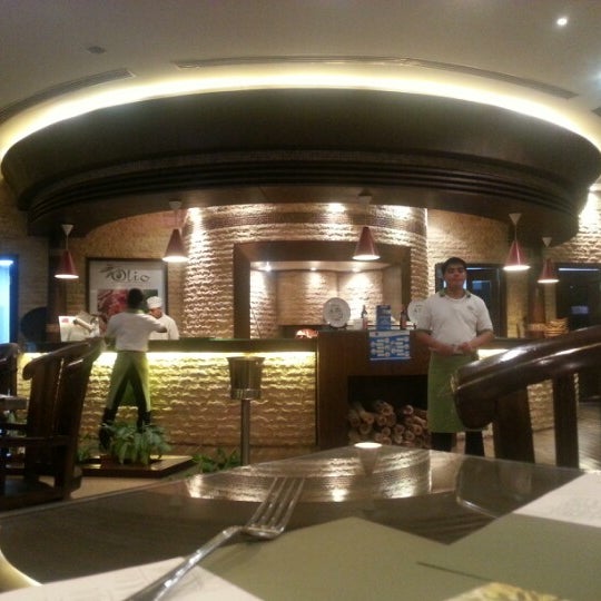 Foto tomada en Olio Italian Restaurant  por Fahd A. el 12/7/2012