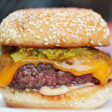 You must try the cheek-and-chuck patty! It's tender and savory, topped with cheese, pickles and onions.