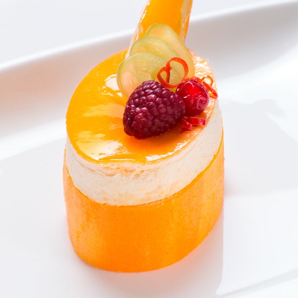 Citrus Orange Charlotte, a delectable dessert crafted by our able chefs to brighten your day!