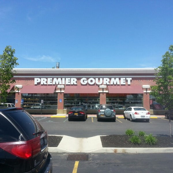 Photo taken at Premier Gourmet by Vince T. on 6/1/2014