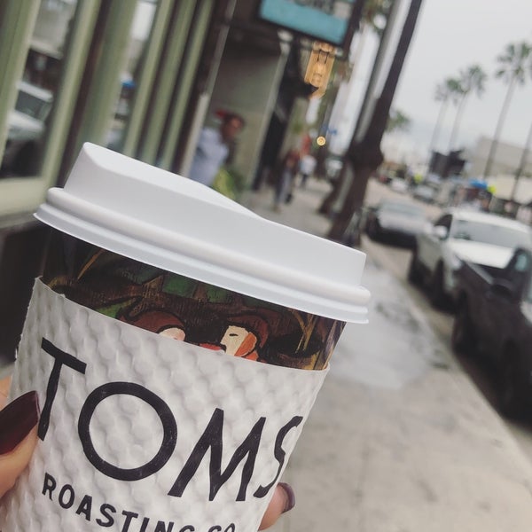 Photo taken at TOMS Flagship by 🌸 :. on 2/2/2019