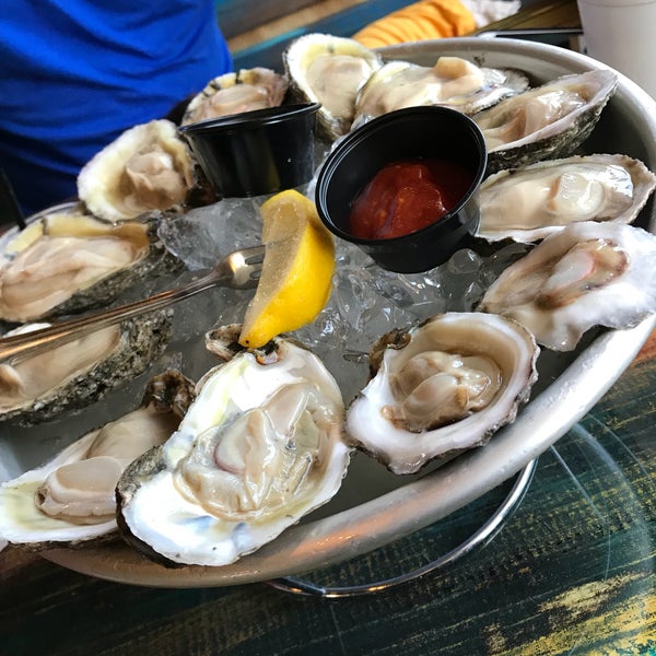 Photo taken at Johnny Longboats by Stephanie on 7/14/2018