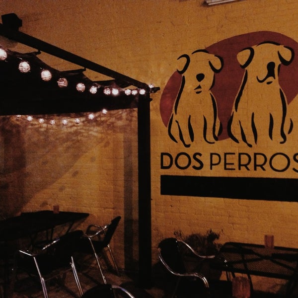 Photo taken at Dos Perros by Brianna on 4/7/2014