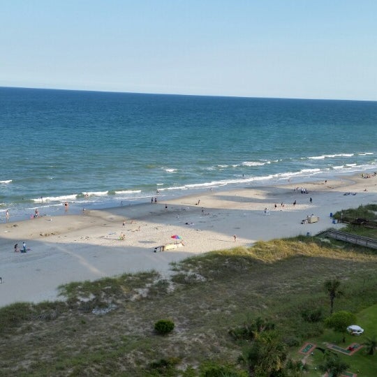 7/1/2014 tarihinde Bonnie R.ziyaretçi tarafından Beach Colony Resort'de çekilen fotoğraf