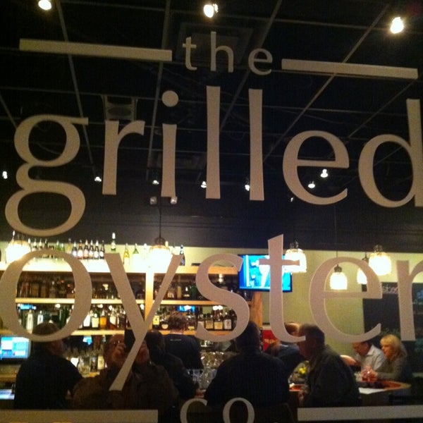 Photo taken at The Grilled Oyster Company by Rob S. on 3/20/2013