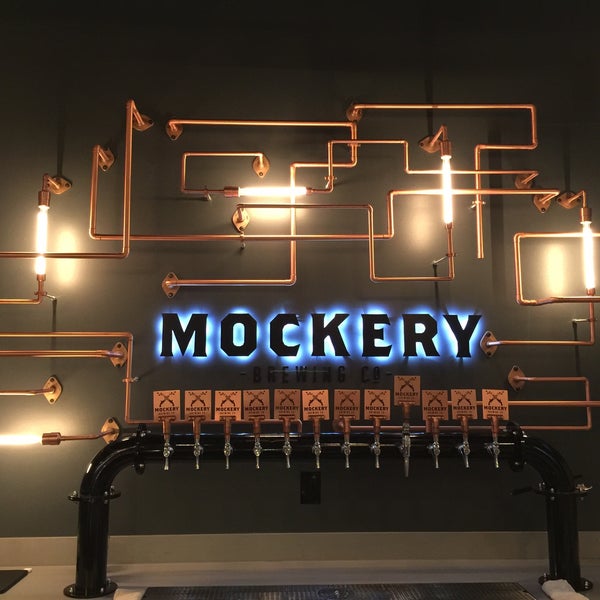 Photo taken at Mockery Brewing by Andrew V. on 12/21/2014