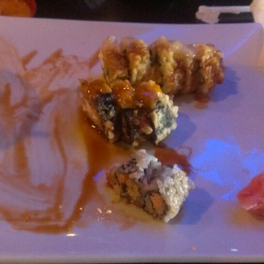 Photo taken at Red Koi Japanese Cuisine by Pamela B. on 2/18/2014