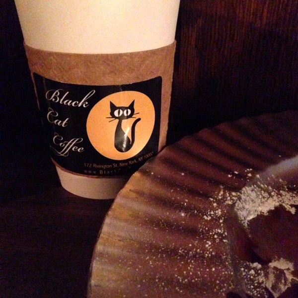 Photo taken at Black Cat Coffee by Chris M. on 11/9/2013
