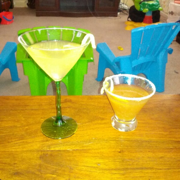 Try the one on the right.  It's called a Sidecar (2oz Cognac, 1oz Cointreau, 1/2 oz FRESHLY SQUEEZED lemon juice, in a chilled cosmopolitan glass or martini glass, with a sugared rim). It's great!!!
