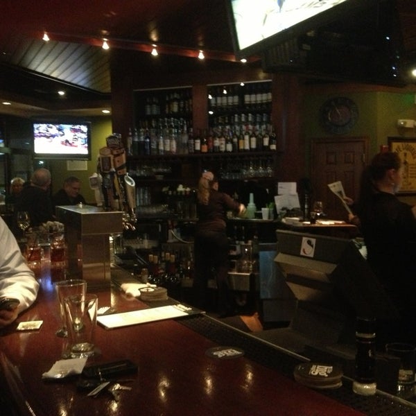 Photo taken at Houlihan&#39;s by Annie S. on 1/30/2013