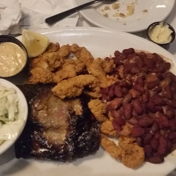 The best place to eat downtown. Live music during today's visit. Pictured is St. Louis ribs, fried catfish, red beans and rice.