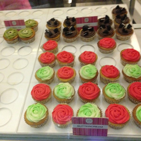 Photo taken at GIGI Coffee &amp; Cupcakes by Lorrie R. on 4/23/2013