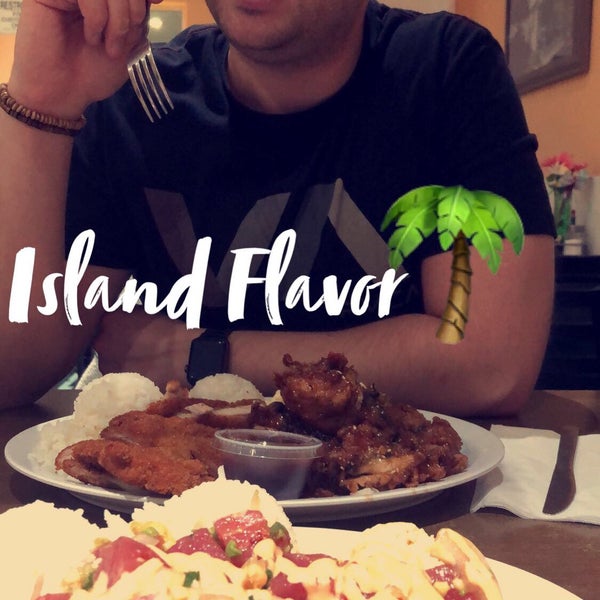 Photo taken at Island Flavor by Michelle D. on 3/11/2018