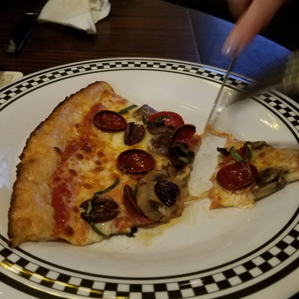 Photo taken at Rocco&#39;s Wood Fired Pizza by Tim C. on 1/16/2018