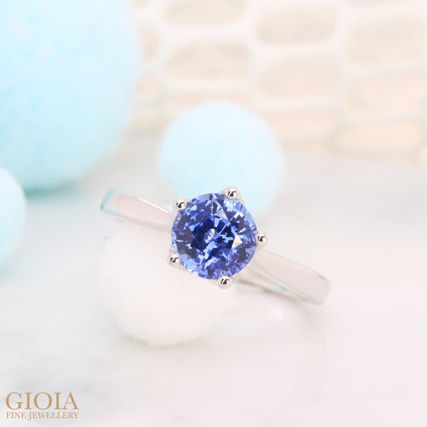 Blue Sapphire Proposal Ring Five prong solitaire proposal ring with tulip head cross detailing securing the round vivid blue unheated sapphire. Warmest congratulation to Da Jun & Tammy!