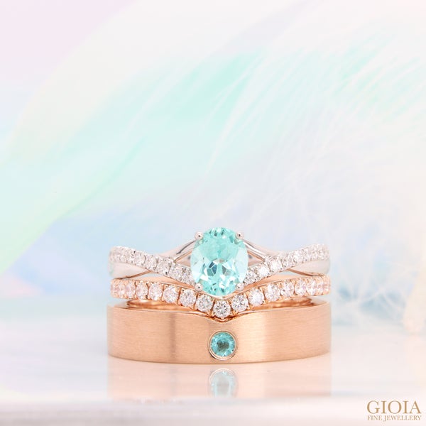 Paraiba Tourmaline Wedding Rings Featuring a stackable set of Paraiba wedding rings, in a unique appearance. Men’s wedding band embedded with Brazil Paraiba.