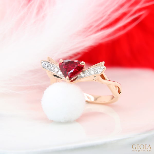 Pigeon Blood Unheated Ring Featuring a unique heart-shaped ruby crafted with wings-inspired design, contrast with pave diamonds. Rare ruby is also birthstone for the month of July!