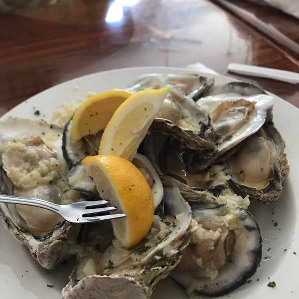 Photo taken at Johnny Longboats by Marcie P. on 4/27/2019