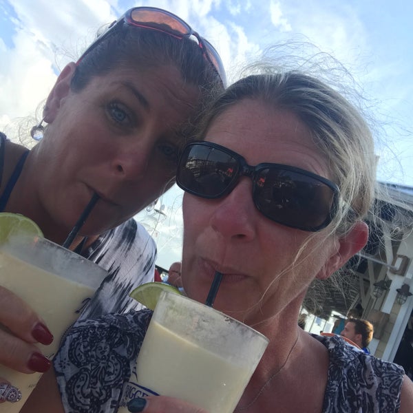Photo taken at Outriggers Tiki Bar and Grille by Marcie P. on 6/2/2018