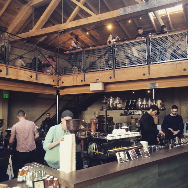 Photo taken at Sightglass Coffee by Kevin X. on 1/24/2015