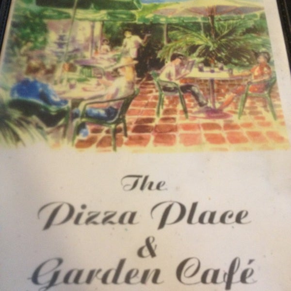 Photo taken at The Pizza Place &amp; Garden Cafe by Colin B. on 5/19/2013