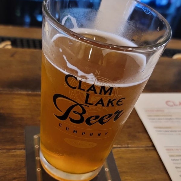 Photo taken at Clam Lake Beer Company by Ashley on 6/5/2021