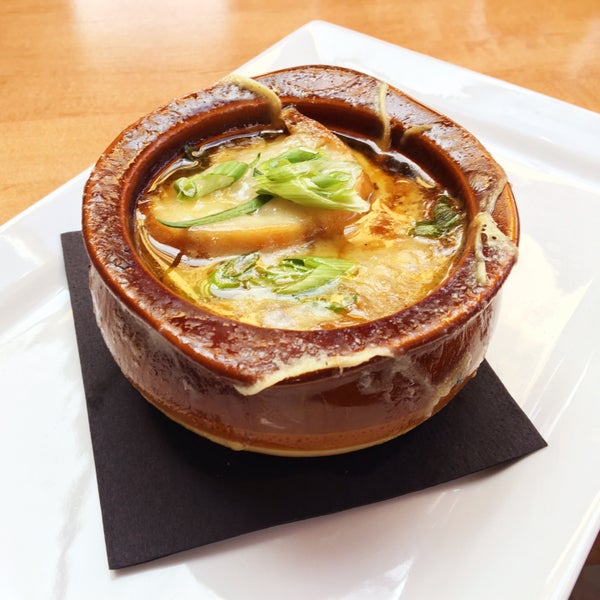 Five Onion Soup - rich beef broth, shredded short ribs, blended onions, grilled ciabatta, Gruyere cheese